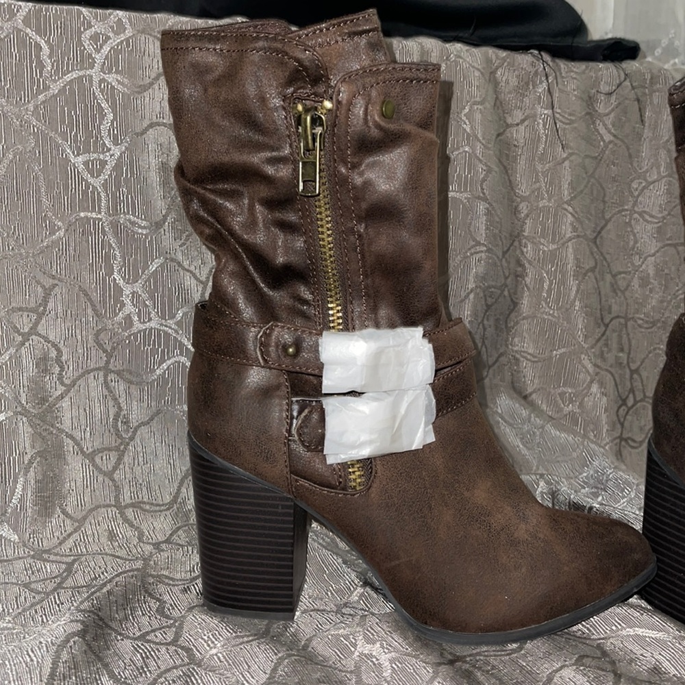 Beautiful new brown heeled boots